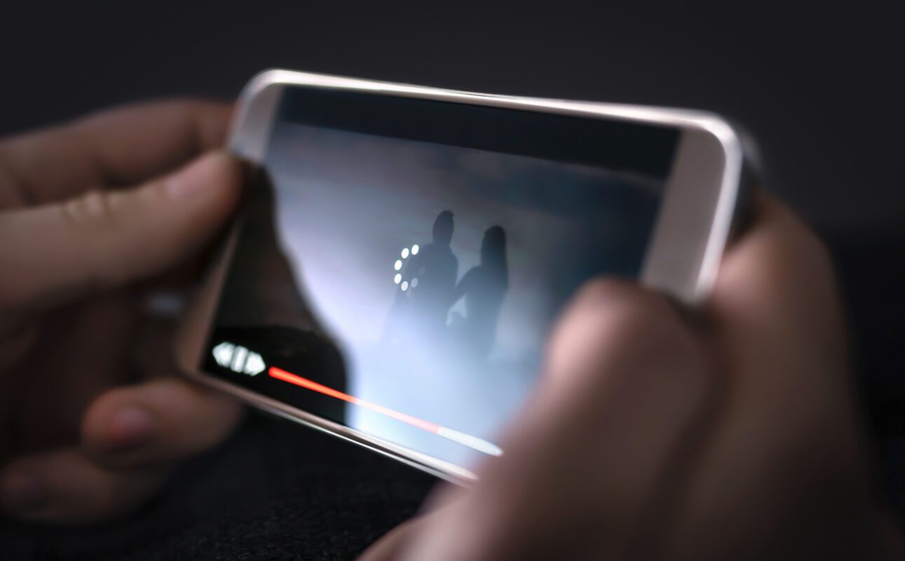 Mobile phone with buffering video